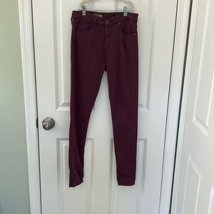 Adriano Goldschmied plum colored skinny jeans.